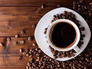 mơ thấy uống cà phê đánh con gì